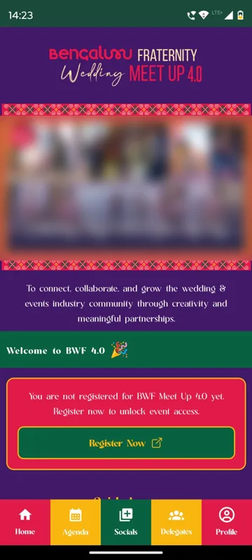 Home screen with the meet-up logo above a sliding banner of event photos, shown blurred, the community line and a Register Now prompt