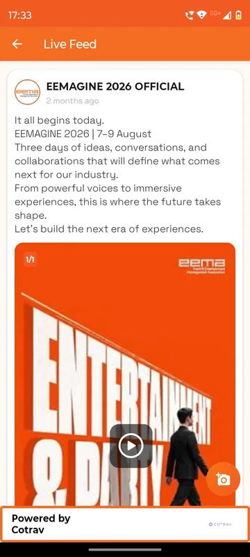 Live feed with an official organiser post, a video poster image and a floating camera button