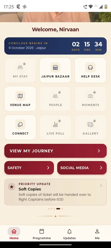 Home with a days, hours and minutes countdown, tiles for My Stay, Jaipur Bazaar, Help Desk, Venue Map, People, Moments, Connect, Live Poll and Gallery, a View My Journey button and a priority update card