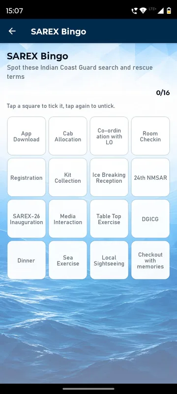 Bingo card of sixteen squares naming workshop moments such as cab allocation, kit collection and the sea exercise, with a progress counter at zero of sixteen